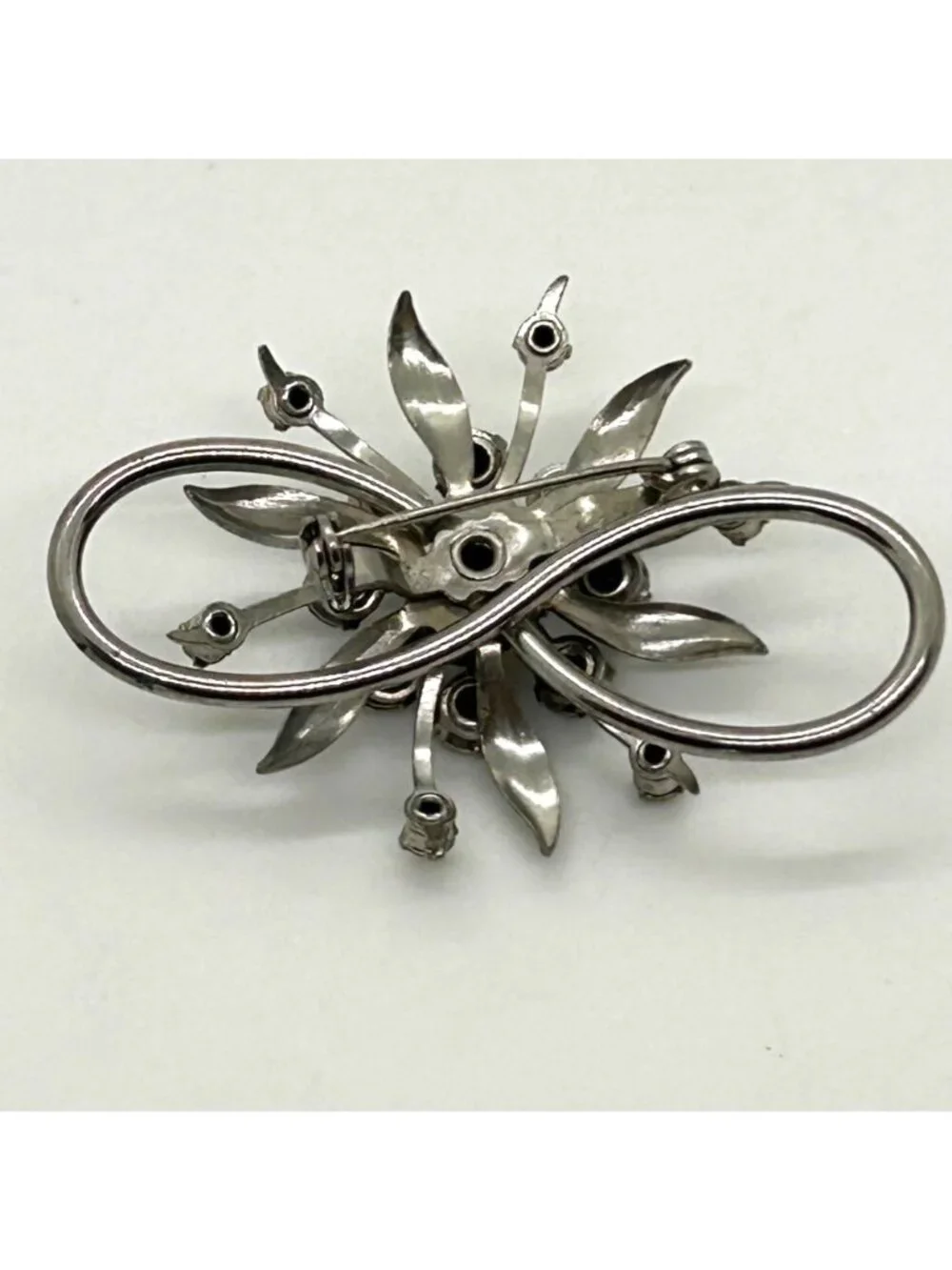 Vintage Clear Rhinestone Brooch Infinity Starburst Floral Pin Silver-tone MCM
